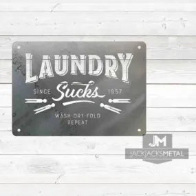 Laundry Sucks sign